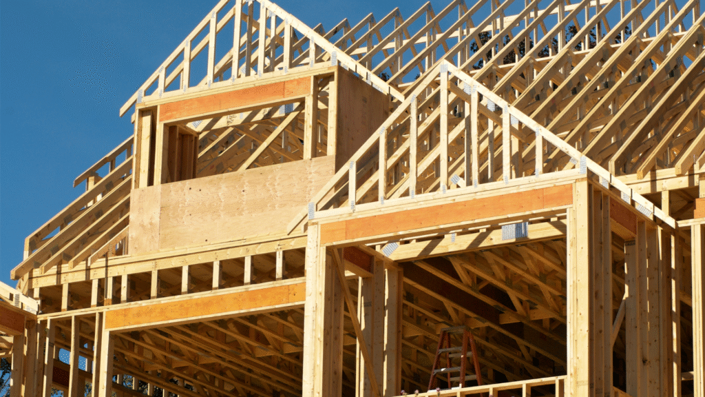 Framing of new multifamily apartment under construction, illustrating the impact of Sunbelt oversupply compared to balanced Midwest rent growth trends.